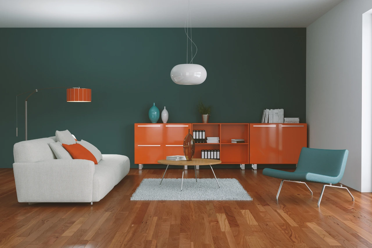 "Modern living room interior with teal green wall, orange storage units, white sofa, and hardwood flooring"