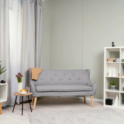 "Modern Scandinavian living room with grey loveseat, white cube shelving units, and minimalist decor"